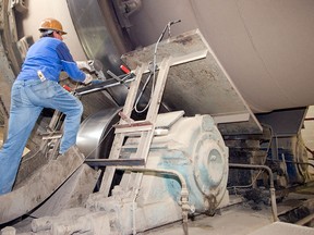 An employee works at a HeidelbergCement factory in Germany. The Canadian government has signed an agreement to support the company in building a carbon capture, utilization and storage (CCUS) system at its Edmonton cement facility.