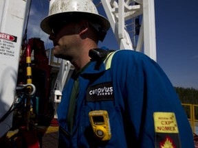 A Cenovus Energy employee at an oil production facility in Alberta.
