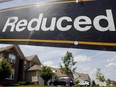 Canadian home prices will continue to decline until the middle of 2023, according to the Canada Mortgage and Housing Corporation's latest housing market outlook.