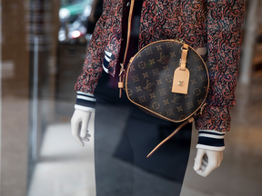 Louis Vuitton bag on a mannequin