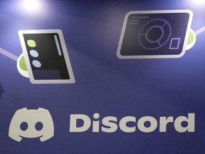 FILE - A display Discord stands at the company's booth at the Game Developers Conference 2023 in San Francisco on March 22, 2023. A major leak of classified U.S. documents that's shaken Washington and exposed new details of its intelligence gathering may have started in a chatroom on the social media platform popular with gamers.