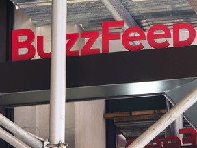 FILE - The entrance to BuzzFeed in New York is seen on Nov. 19, 2020. Pulitzer prize winning digital media company BuzzFeed is cutting about 15% of its staff, according to multiple media reports. In a memo sent to staff, co-founder and CEO Jonah Peretti said that the New York company was going to start the process of shutting down its news division, and that cuts would also occur across its business, content, tech and administrative teams.