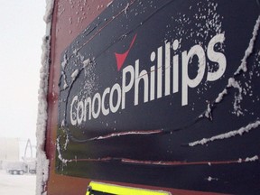 FILE - An ice-covered ConocoPhillips sign is displayed at the Colville-Delta 5, or as it's more commonly known, CD5, drilling site on Alaska's North Slope, Feb. 9, 2016. Construction can proceed related to a major oil project on Alaska's petroleum-rich North Slope after a federal judge on Monday, April 3, 2023, rejected requests to halt work until challenges to the Biden administration's recent approval are resolved.