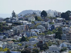 Residential properties are shown on a hill in San Francisco, Tuesday, April 18, 2023. On Thursday, the National Association of Realtors reports on sales of existing homes in March.