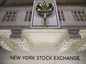 FILE - The opening bell is seen on the floor at the New York Stock Exchange in New York, March 28, 2023. Wall Street is slipping in the first trading for stocks after a report raised speculation the Federal Reserve may tap the brakes a little harder on the economy. The S&P 500 was 0.6% lower in early Monday, April 10, 2023 trading.