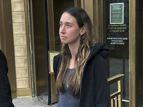 Charlie Javice, of Miami Beach, Fla., leaves Manhattan federal court, Tuesday, April 4, 2023, in New York, after signing a $2-million bond to remain free on charges that she duped J.P. Morgan Chase with fake records to acquire Frank, her student loan assistance startup company, for $175-million. Prosecutors say she claimed her company had over 4 million customers when it had fewer than 300,000 clients. Javice, 31, was arrested Monday night in New Jersey on conspiracy, wire and bank fraud charges.