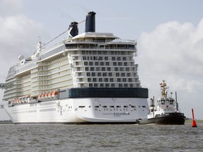 FILE - The cruiser Celebrity Equinox built by the shipyard Meyer in Papenburg, Germany, goes down the river Ems near Gandersum on Saturday, June 20, 2009. A widow and her family are suing Celebrity Cruises for allegedly mishandling her husband's body after he died while they were on the Celebrity Equinox in August 2022, saying it was left to decompose and they suffered extreme emotional trauma.