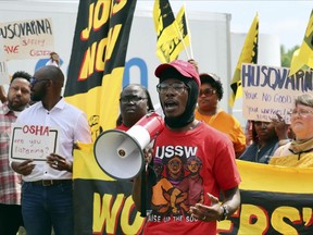 Sersie Cobb, a forklift operator, speaks at a strike outside a Ryder System Inc. warehouse in Columbia, S.C., Tuesday, April 4, 2023. The Union of Southern Service Workers filed a federal complaint Tuesday accusing the South Carolina Occupational Safety and Health Administration of neglecting to plan inspections of industries with predominantly Black workers.