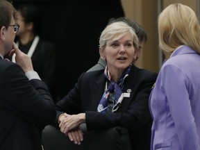 U.S. Energy Secretary Jennifer Granholm, center, has a small talk with her counterparts before a plenary session in the G-7 ministers' meeting on climate, energy and environment in Sapporo, northern Japan, Saturday, April 15, 2023.