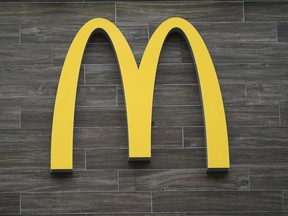 This photo shows a logo of a McDonald's restaurant in Havertown, Pa., on April 26, 2022. A report says McDonald's has closed its U.S. offices for a few days as the company prepares to inform employees about layoffs.