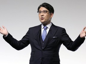 FILE - Koji Sato, President of Toyota Motor Co., delivers a speech during a news conference on April 7, 2023, in Tokyo. Toyota's new president Sato has promised what he called an aggressive shift on "electrification," while acknowledging criticism that Japan's top automaker has fallen behind.
