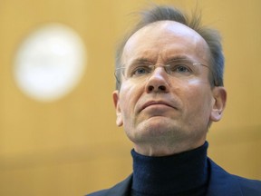 FILE - Former Wirecard CEO Markus Braun sits in the dock in the courtroom at the start of the trial against the former CEO and two co-defendants at Munich Regional Court 1 Munich, Germany, Thursday, Dec. 8, 2022. The German arm of EY, one of the world's Big Four accounting firms, has been fined 500,000 euros ($544,630) after acting as the auditor for collapsed payments company Wirecard and has been barred from auditing certain kinds of companies in Germany for two years.