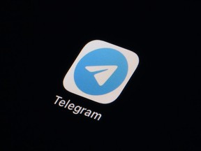 FILE - The icon for the instant messaging Telegram app is seen on a smartphone, Tuesday, February 28, 2023, in Marple Town, Pa.  A federal judge in Brazil on Wednesday, April 26, ordered the temporary suspension of messaging app Telegram, citing allegations the social networking platform failed to provide all the information that the Federal Police request on neo-Nazi chat groups.