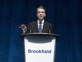 Brookfield Asset Management's CEO Bruce Flatt attends the company's AGM in Toronto on Wednesday May 6, 2015. Brookfield Asset Management Ltd. says its share of the latest quarterly profit of the asset management business it owns with Brookfield Corp. amounted to US$125 million.