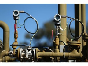Pressure transmitters display readings on a Santos Ltd. pilot well operating in the Pilliga forest in Narrabri, Australia, on Thursday, May 25, 2017. A decade after the shale revolution transformed the U.S. energy landscape, Australia -- poised to overtake Qatar as the world's biggest exporter of liquefied natural gas -- is experiencing its own quandary over natural gas. Photographer: Brendon Thorne/Bloomberg