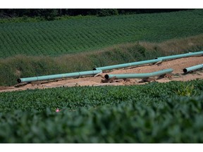 Sections of pipe sit at an Energy Transfer Partners LP construction site for the Sunoco Inc. Mariner East 2 natural gas liquids pipeline project near Morgantown, Pennsylvania, U.S. on Aug. 4, 2017. The Pennsylvania Department of Environmental Protection has issued four notices of violation after "inadvertent" spills of drilling fluids associated with horizontal directional drilling for the project. Photographer: Charles Mostoller/Bloomberg