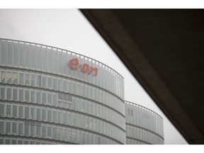 A logo sits on the exterior the EON SE headquarters in Essen, Germany, on Tuesday, March 13, 2018. EON will shed as many as 5,000 jobs in the deal to take over Innogy SE, a move that marks the biggest shakeup in Germany's energy business in years. Photographer: Jasper Juinen/Bloomberg