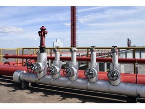 Valve control wheels are seen at ENN Energy Holdings Ltd.'s liquefied natural gas (LNG) terminal on Zhoushan Island, Zhejiang province, China, on Thursday, Nov.  1, 2018. Gas is in such hot demand in China right now it's allowing a quirky market to flourish: transporting the fuel on trucks.  The country's top suppliers are loading liquefied natural gas onto tanker trucks and delivering it to users to make up for sufficient pipeline coverage inland.  Photographer: Qilai Shen/Bloomberg