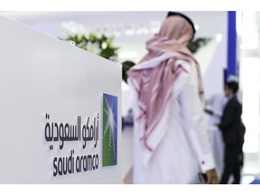 A Saudi Aramco logo on display during the Abu Dhabi International Petroleum Exhibition and Conference (ADIPEC) in Abu Dhabi, United Arab Emirates, on Tuesday, Nov. 13, 2018. Photographer: Christopher Pike/Bloomberg
