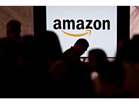 Signage is displayed on a monitor during an Amazon Career Day event in Arlington, Virginia, U.S., on Tuesday, Sept. 17, 2019. Amazon.com Inc. is hosting the event in six regions across the U.S. where potential employees can learn about the 30,000 full and part-time jobs available at Amazon, with over 1,600 full and part-time open positions in Arlington and other locations in Virginia. Photographer: Andrew Harrer/Bloomberg