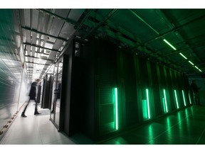 Green lights illuminate the Sberbank and SberCloud Christofari supercomputer during an event to mark its launch into commercial operation inside the Sberbank PJSC data processing center (DPC) at the Skolkovo Innovation Center in Moscow, Russia, on Monday, Dec. 16, 2019. As Sberbank expands its technology offerings, the Kremlin is backing legislation aimed at keeping the country's largest internet companies under local control by limiting foreign ownership.