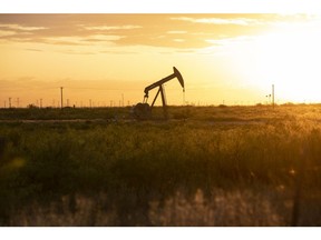 A pump jack operates just outside of Midland, Texas, U.S, on Friday, April 24, 2020. The price for the U.S. benchmark for crude oil, West Texas Intermediate, dropped below zero for the first time in history this month amid a global oil glut. Photographer: Matthew Busch/Bloomberg