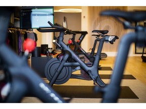 A Peloton stationary bike for sale at the company's showroom in Dedham, Massachusetts, U.S., on Wednesday, Feb. 3, 2021. Peloton Interactive Inc. is scheduled to release earnings figures on February 4. Photographer: Adam Glanzman/Bloomberg