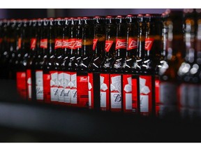 Bottles of Budweiser beer on a conveyor at the Anheuser-Busch InBev NV brewery in Leuven, Belgium, on Tuesday, May 4, 2021. AB Inbev reports first quarter earnings on May 6.