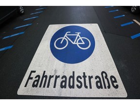 A bike symbol on a cycle route on the Taunusstrasse cycling street in Offenbach, Germany, on Tuesday, July 6, 2021. Urban planning, which has traditionally been dominated by male decision makers, is now under pressure to make networks less-focused around men commuting to work.