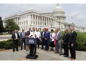 WASHINGTON, DC - JULY 29: U.S. Rep. Scott Perry (R-PA) (5th L) speaks during a news conference outside the U.S. Capitol July 29, 2021 in Washington, DC. The House Freedom Caucus held a news conference to call for Reps. Liz Cheney (R-WY) and Adam Kinzinger (R-IL) to be expelled as members of the House Republican Conference.