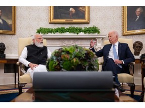 WASHINGTON, DC - SEPTEMBER 24: U.S. President Joe Biden (R) and Indian Prime Minister Narendra Modi participate in a bilateral meeting in the Oval Office of the White House on September 24, 2021 in Washington, DC. President Biden is hosting a Quad Leaders Summit later today with Prime Minister Modi, Australian Prime Minister Scott Morrison and Japanese Prime Minister Suga Yoshihide.