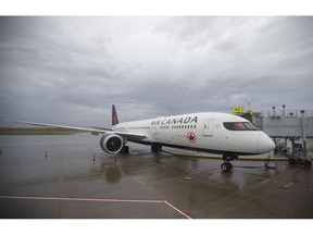 An Air Canada Boeing 787 Dreamliner at Montreal-Pierre Elliott Trudeau International Airport (YUL) in Montreal, Quebec, Canada, on Tuesday, Oct. 26, 2021. Air Canada is scheduled to release earnings figures on November 2.