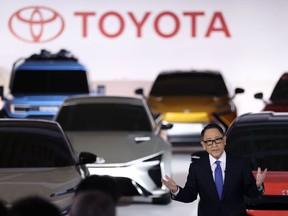 Akio Toyoda, president of Toyota Motor Corp., speaks during a news conference at the company's showroom in Tokyo, Japan, on Tuesday, Dec. 14, 2021. The world's biggest carmaker is planning to invest 4 trillion yen ($35.2 billion) to supercharge its EV push, with a target to sell 3.5 million units annually by the end of the decade, according to Toyoda. Toyota will roll out 30 electric models by 2030, a step up from a prior plan to introduce 15 EVs globally by 2025.