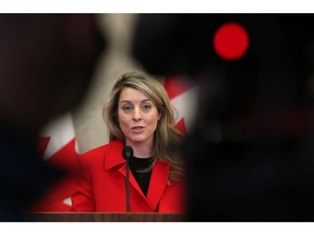 Melanie Joly, Canada's foreign affairs minister, speaks during a news conference in Ottawa, Ontario, Canada, on Wednesday, Jan. 26, 2022. The Canadian government will extend its military training mission in Ukraine until 2025 and immediately add 60 troops to the 200 who are already there, Trudeau said.