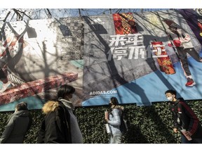 An Adidas AG advertisement in Shanghai, China. Photographer: Qilai Shen/Bloomberg