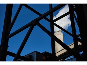 A chimney flue vents steam at the Kusile coal-fired power station, operated by Eskom Holdings SOC Ltd., in Delmas, Mpumalanga province, South Africa, on Wednesday, June 8, 2022. The coal-fired plant's sixth and last unit is expected to reach commercial operation in two years, with the fifth scheduled to be done by December 2023. Photographer: Waldo Swiegers/Bloomberg