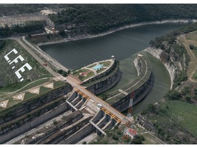 The Comision Federal de Electricidad (CFE) Angostura hydroelectric dam, officially known as the Belisario Dominguez Dam, on the Grijalva River near Venustiano Carranza, Chiapas state, Mexico, on Monday, July 18, 2022. France's Engie SA, Italy's Enel SpA and Spain's Acciona Energia SA are among the foreign companies that Mexico's energy regulator has blocked from operating wind and solar plants as the government seeks to concentrate power in the hands of the state utility, CFE.
