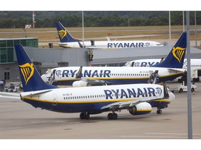 Passenger aircraft, operated by Ryanair Holdings Plc, on the tarmac at London Stansted Airport, operated by Manchester Airport Plc, in Stansted, U.K., on Monday, July 25, 2022.  Photographer: Chris Ratcliffe/Bloomberg
