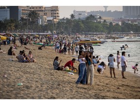 Visitors at a beach in Pattaya, Thailand, on Sunday, March 5, 2023. Thailand welcomed 2.14 million foreign tourists in January, supported by the peak travel season and China's reopening, as the country's vital tourism industry continued its revival.