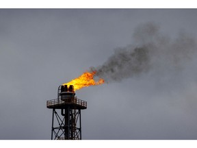 A flare stack burns at the PCK Schwedt oil refinery, formerly owned by Rosneft PJSC and now controlled by the German government, in Schwedt, Germany, on Monday, March 20, 2023. Germany's economy will probably shrink in the first quarter of the year, according to the ZEW institute's gauge of expectations, as concerns over risks in the banking sector add to headwinds from inflation, even as the rate should decline "significantly", the Bundesbank said. Photographer: Krisztian Bocsi/Bloomberg