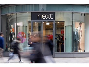 A Next Plc clothing store in London, UK, on Monday, March 27, 2023. Next are due to release their preliminary full year results on Wednesday.
