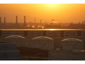 Oil storage tanks in the Keihin industrial area in Kawasaki, Kanagawa Prefecture, Japan, on Monday, April 10, 2023. Saudi Arabia hiked official selling prices for all of its oil sales to Asian customers in May, days after the kingdom led a surprise OPEC+ output cut. Photographer: Toru Hanai/Bloomberg