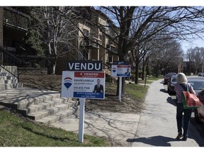 A "Sold" sign in Lasalle, Quebec, Canada, on Saturday, April 15, 2023. Canadian home prices rose for the first time in a year after the country's central bank halted its interest rate hikes and sellers remained hesitant to list their properties.