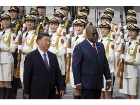 BEIJING, CHINA - MAY 26: Democratic Republic of Congo's President Felix Tshisekedi and Chinese President Xi Jinping attend a welcoming ceremony at the Great Hall of the People on May 26, 2023 in Beijing, China.