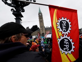 Picketers march on Parliament Hill as approximately 155,000 public sector union workers with the Public Service Alliance of Canada (PSAC) continued to strike on April 26.