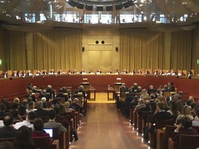 FILE - Judges preside over a hearing at the European Court of Justice in Luxembourg, on Nov. 27, 2018. A top European Union court ruled Wednesday, May 24, 2023, that the European Commission was wrong to approve millions of euros (dollars) in aid to help Italian airlines cope with the impact of COVID-19 restrictions. The EU general court said the European Commission _ the bloc's executive arm _ failed to provide "a statement of reasons for its finding that the measure at issue was not contrary to EU law provisions other than those governing state aid."