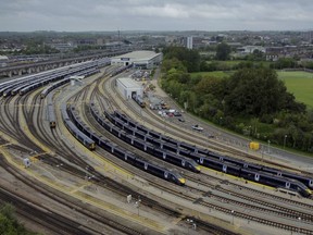 Southeastern trains in sidings at Ashford International railway station in Kent, Britain, as members of the drivers' union Aslef have staged a walk out during their long-running dispute over pay, Friday May 12, 2023. The U.K. economy grew sluggishly during the first three months of the year as double-digit inflation curbed consumer spending and labor unrest curtailed output in industries ranging from transportation to healthcare and education.