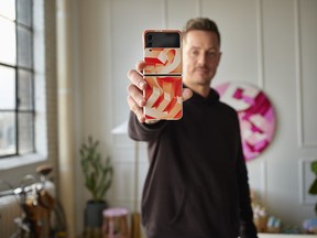 Multi-disciplinary creative, Ben Johnston shows off the Samsung Galaxy Z Flip4 case he designed as part of the Samsung Canada Flex Your Design contest