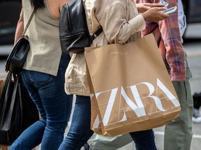 Consumer spending increased 5.7 per cent annualized from the previous quarter as Canadians spent more on cars and clothing.