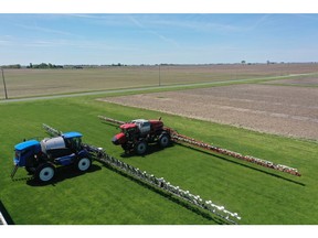 CNH Industrial brands Case IH (right) and New Holland (left) sprayers equipped with One Smart Spray technology